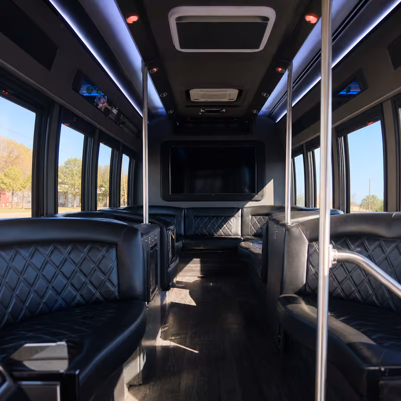 Friends laughing during a Stockton party bus celebration