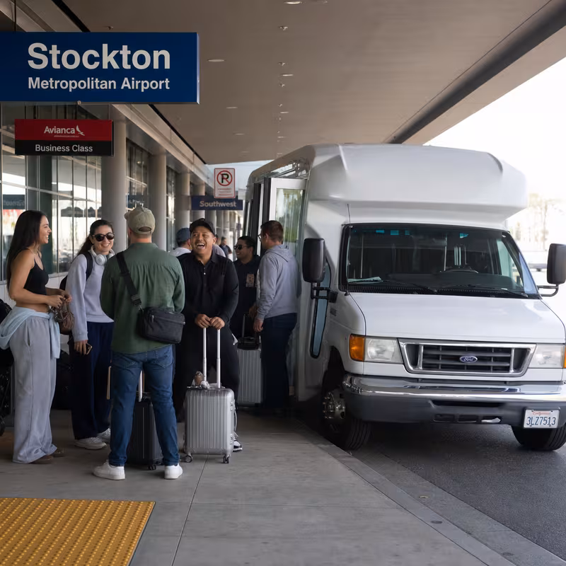 Black Mercedes Sprinter van staged for an Stockton Airport Transportation group