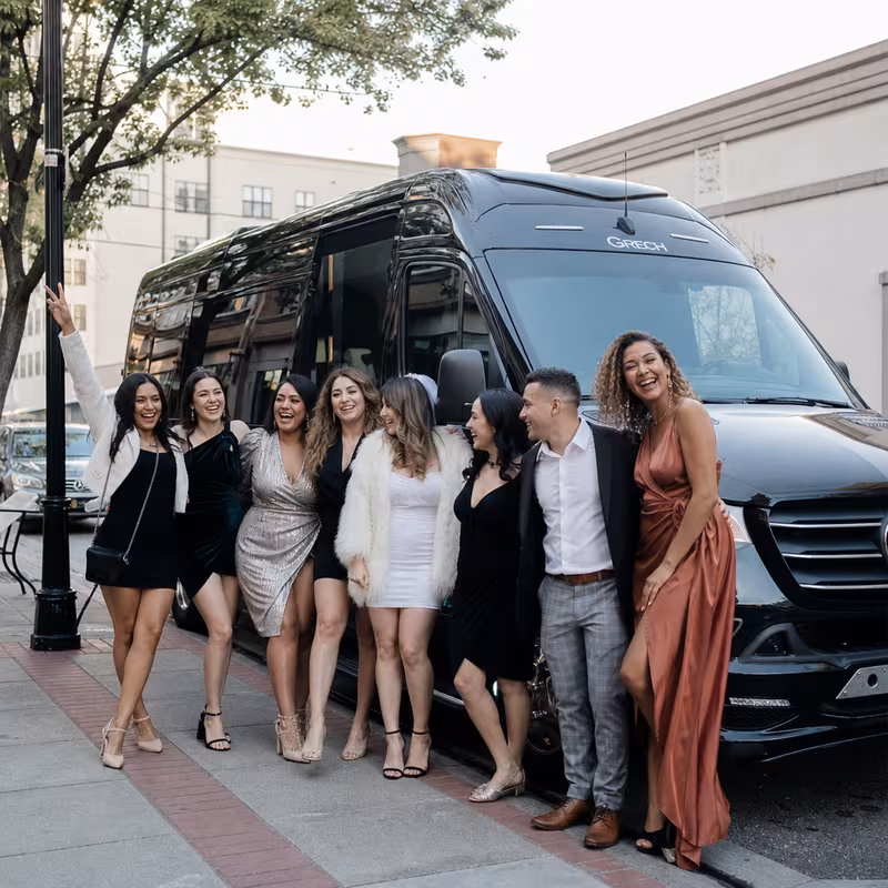 Group boarding a white charter bus for Bachelor & Bachelorette Transportation transportation in Stockton