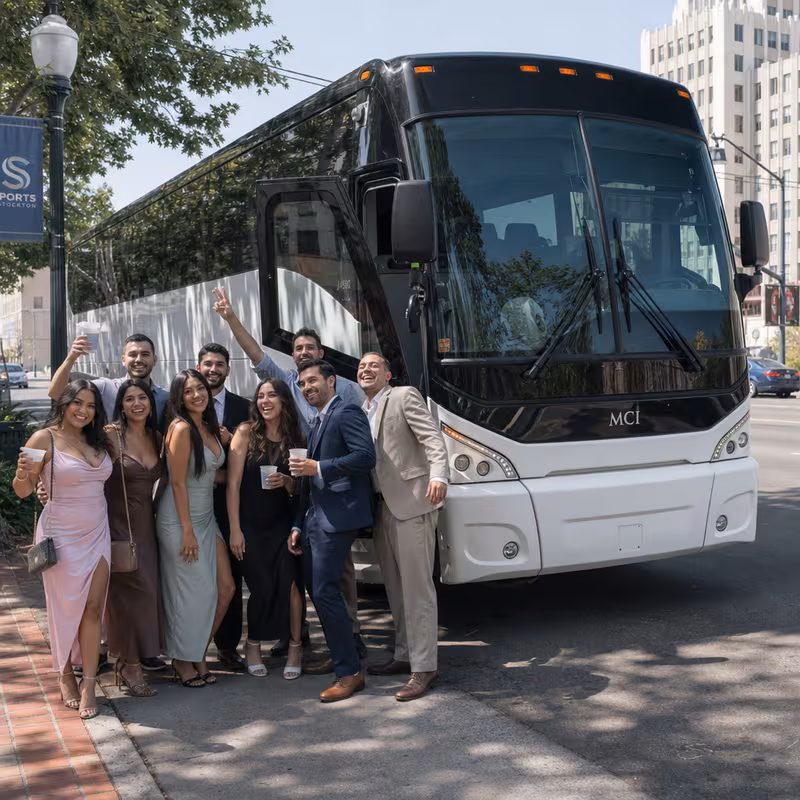 Passengers loading luggage while boarding an Stockton group shuttle