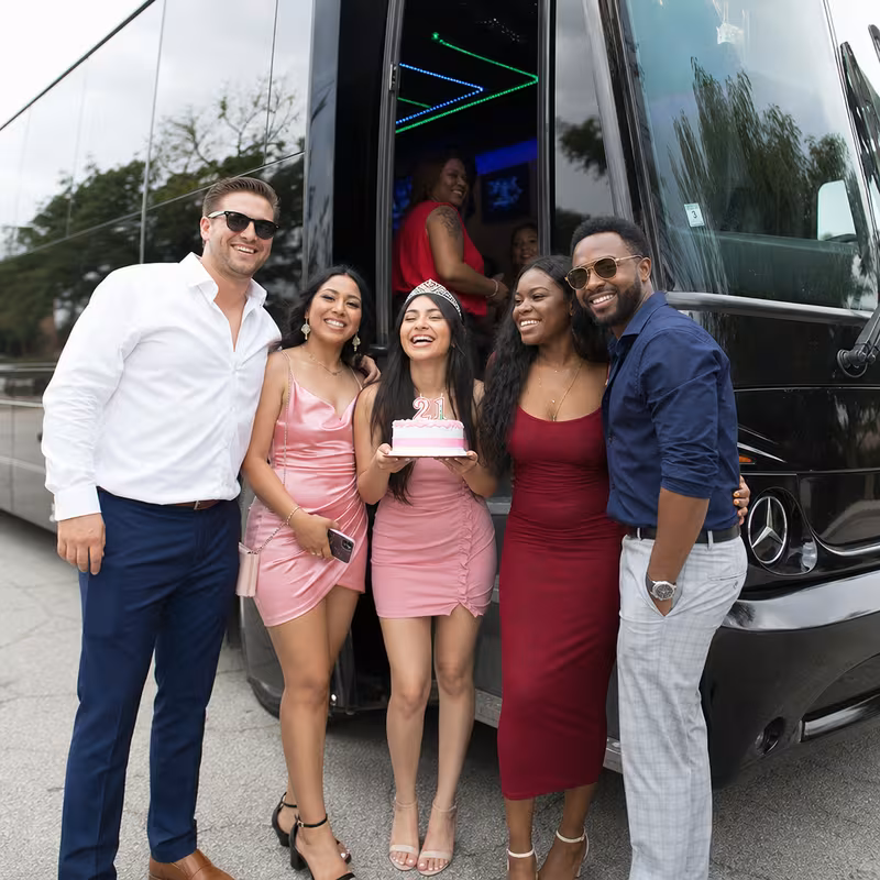 Party bus interior with wraparound leather seating and LED lighting in Stockton