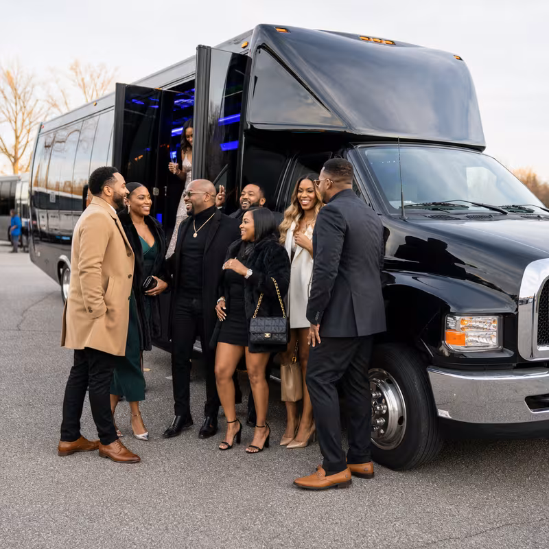Passengers loading luggage while boarding an Stockton group shuttle