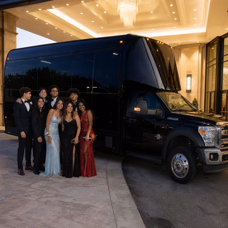 Party bus interior with wraparound leather seating and LED lighting in Stockton