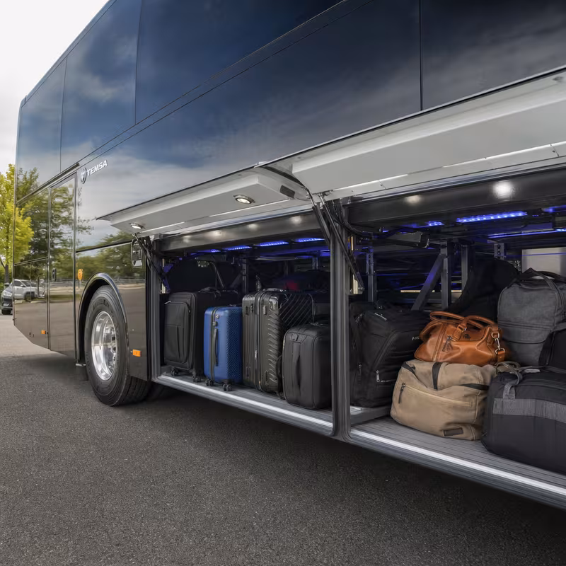 Party bus interior with wraparound leather seating and LED lighting in Stockton